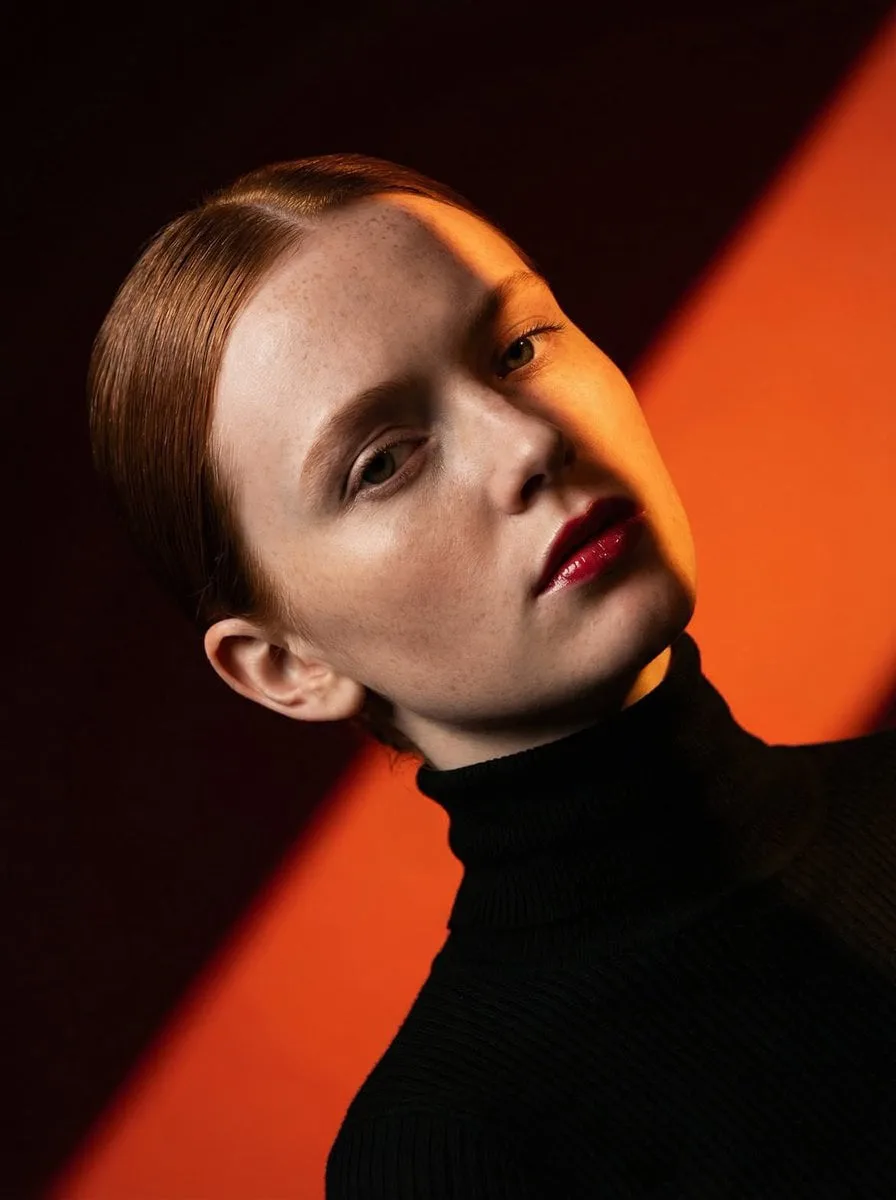Ultra-high-fashion editorial beauty portrait of a fair-sk...