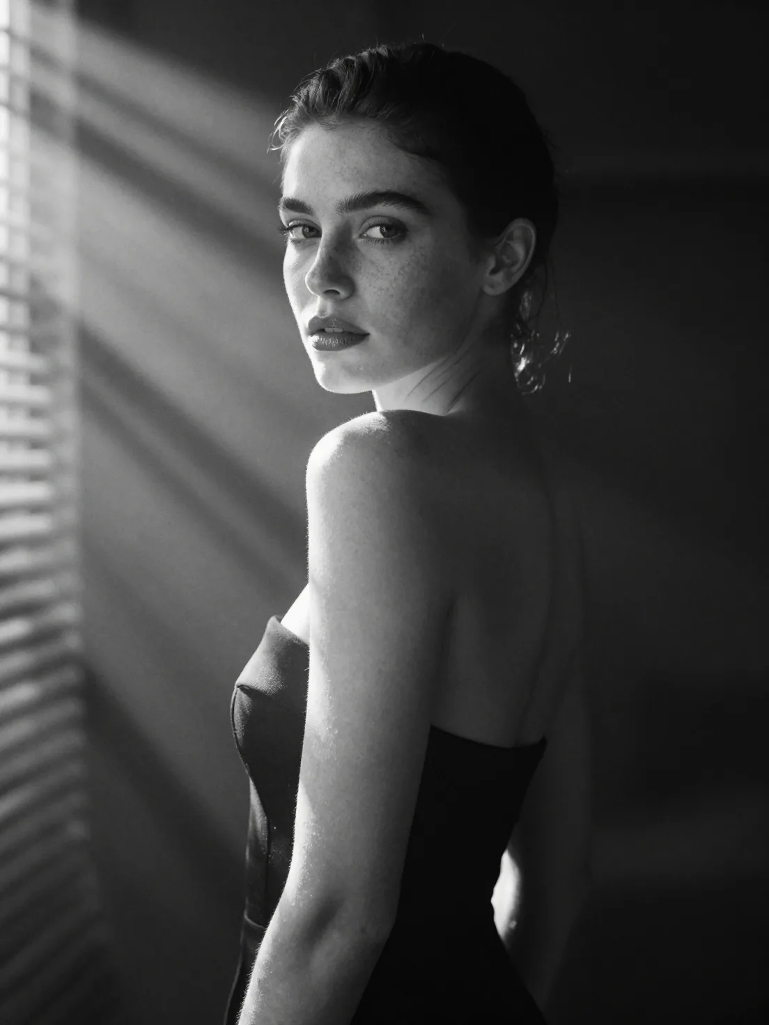 A hyperrealistic 8k black and white cinematic mid shot po...